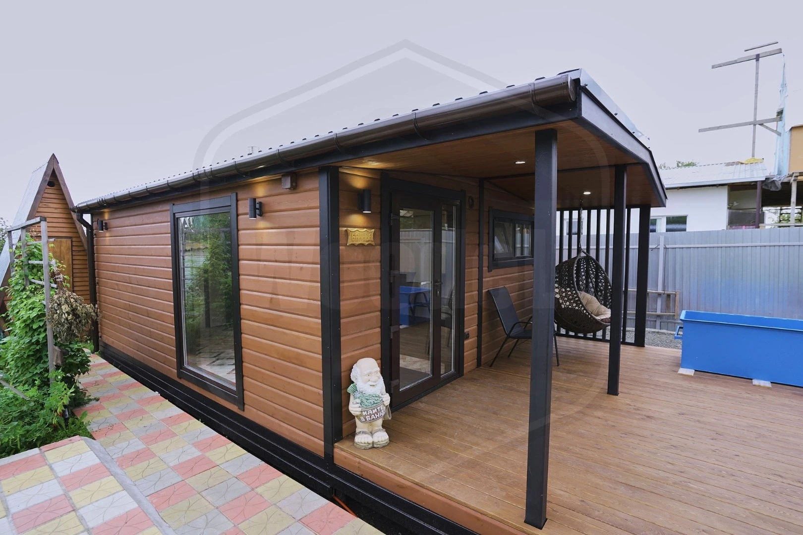 Баня Woodel Heat 4,5х6 с большой террасой