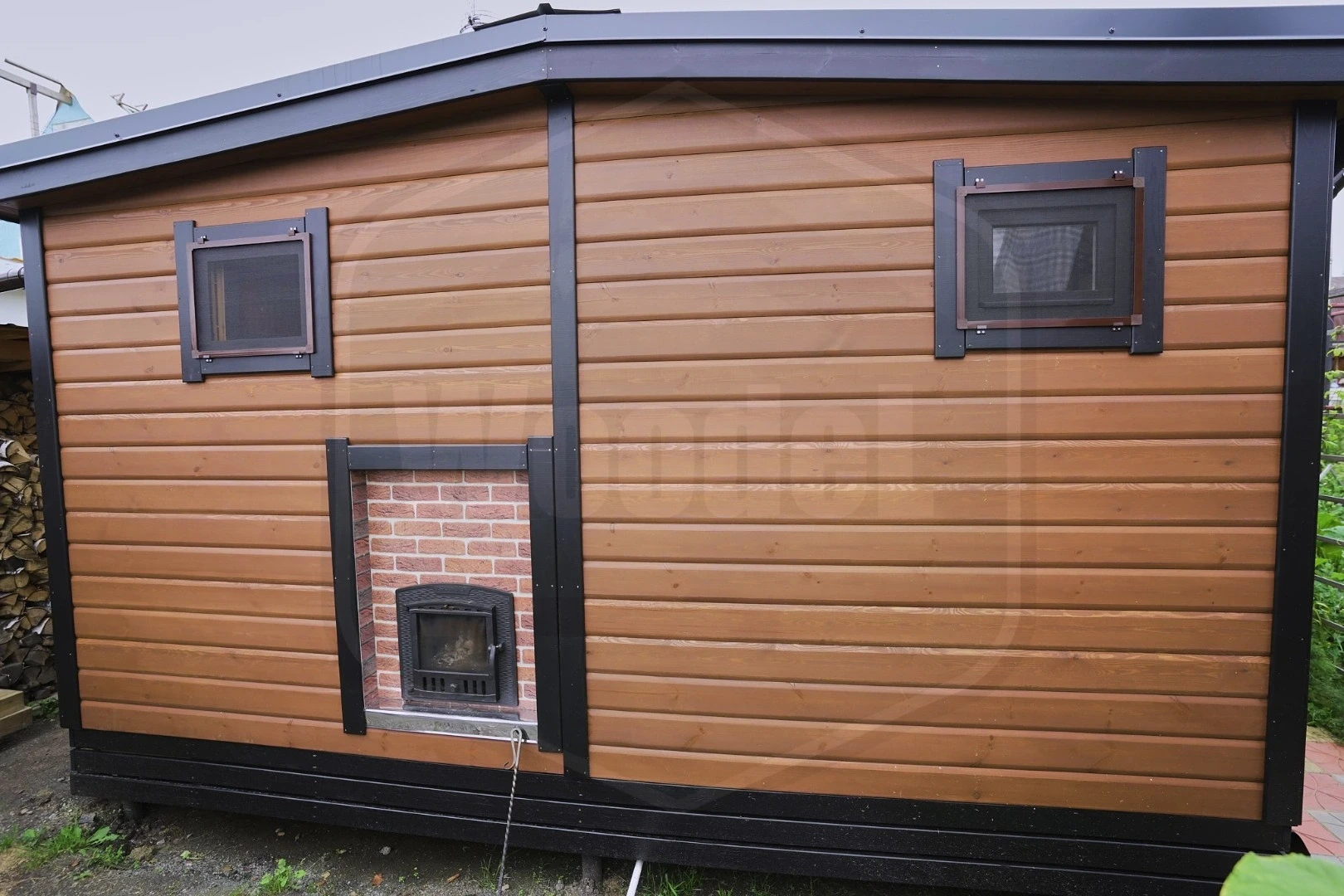 Баня Woodel Heat 4,5х6 с большой террасой