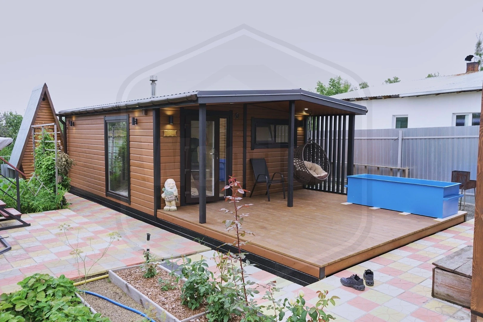 Баня Woodel Heat 4,5х6 с большой террасой