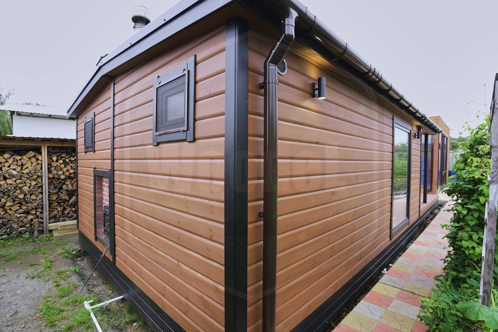 Баня Woodel Heat 4,5х6 с большой террасой